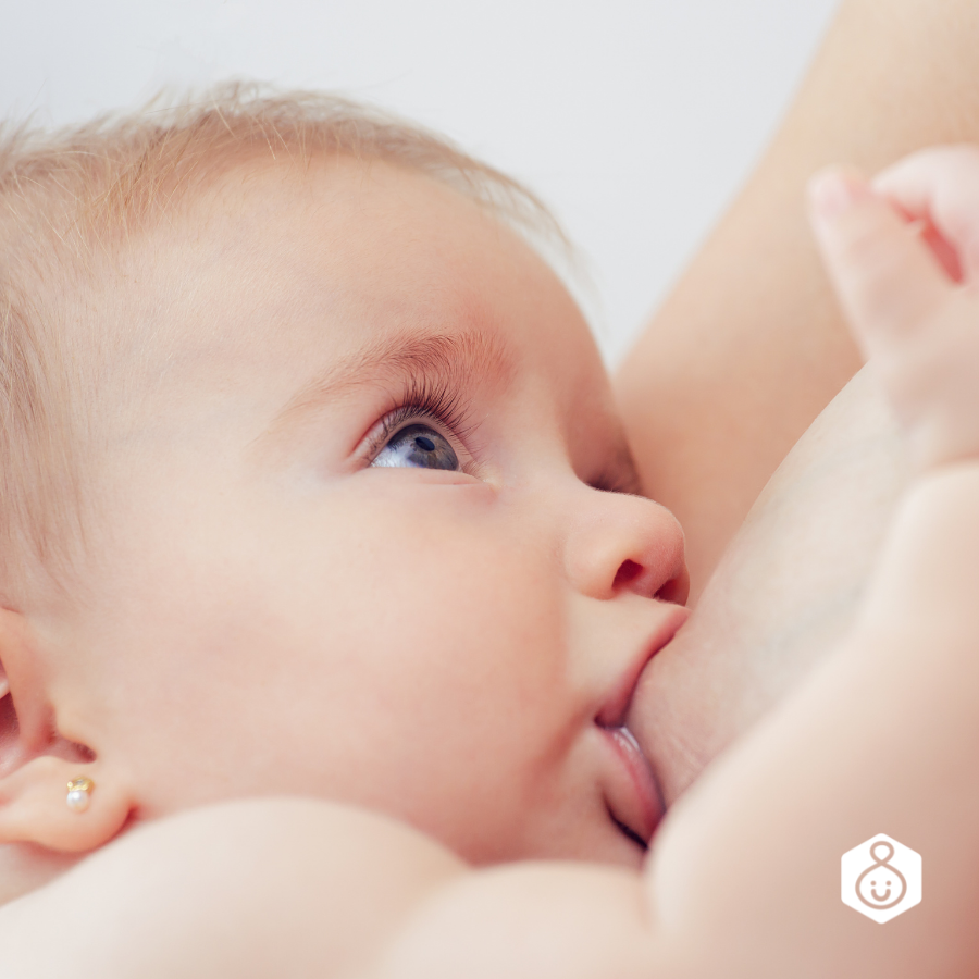 baby nursing and mother aware of breastmilk quality